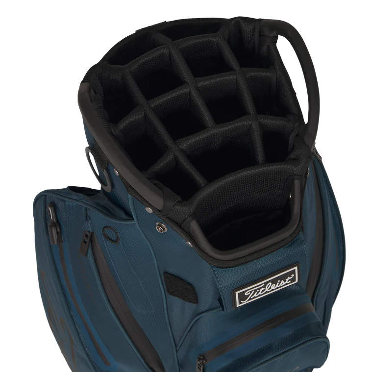 Blue golf bag with black interior on a white background