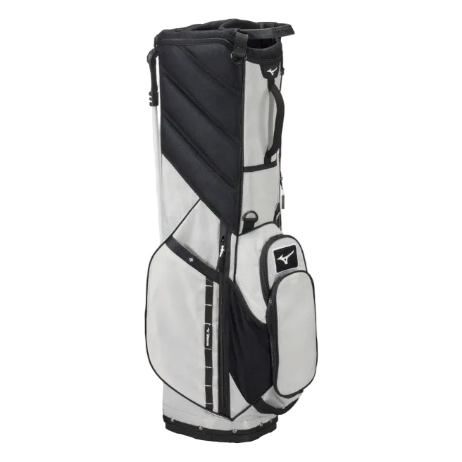 A Mizuno stand golf bag in white and black, featuring multiple pockets, zippered compartments, and the signature Mizuno logo on the front pocket.