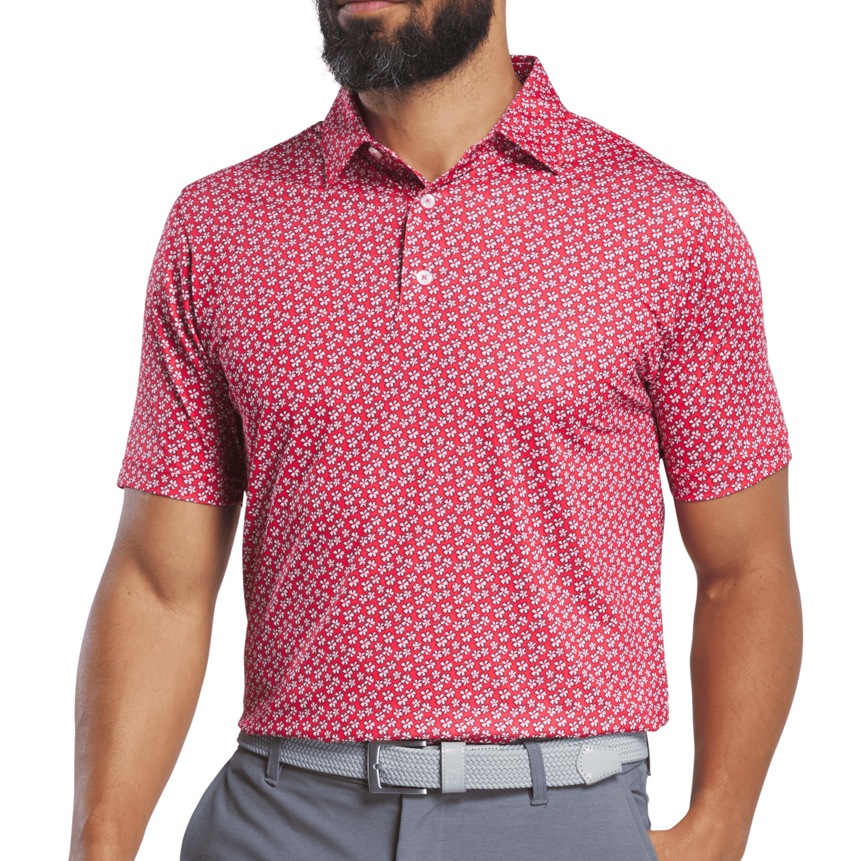 Man wearing a red patterned polo shirt and gray pants on a transparent background