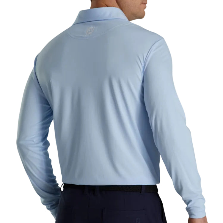 man wearing light blue golf polo long sleeve