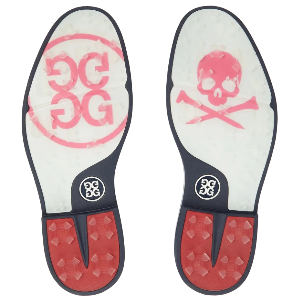 Pair of golf shoe insoles with pink skull design and red soles on a white background