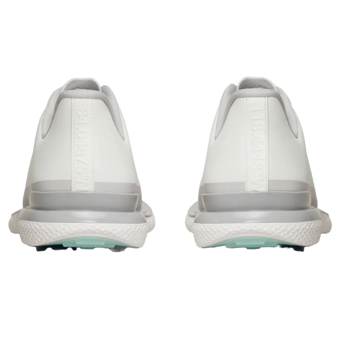White golf shoes with a light gray sole on a white background
