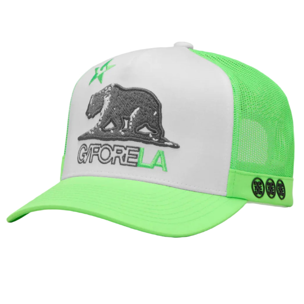 Green and white cap with a logo on a gray background