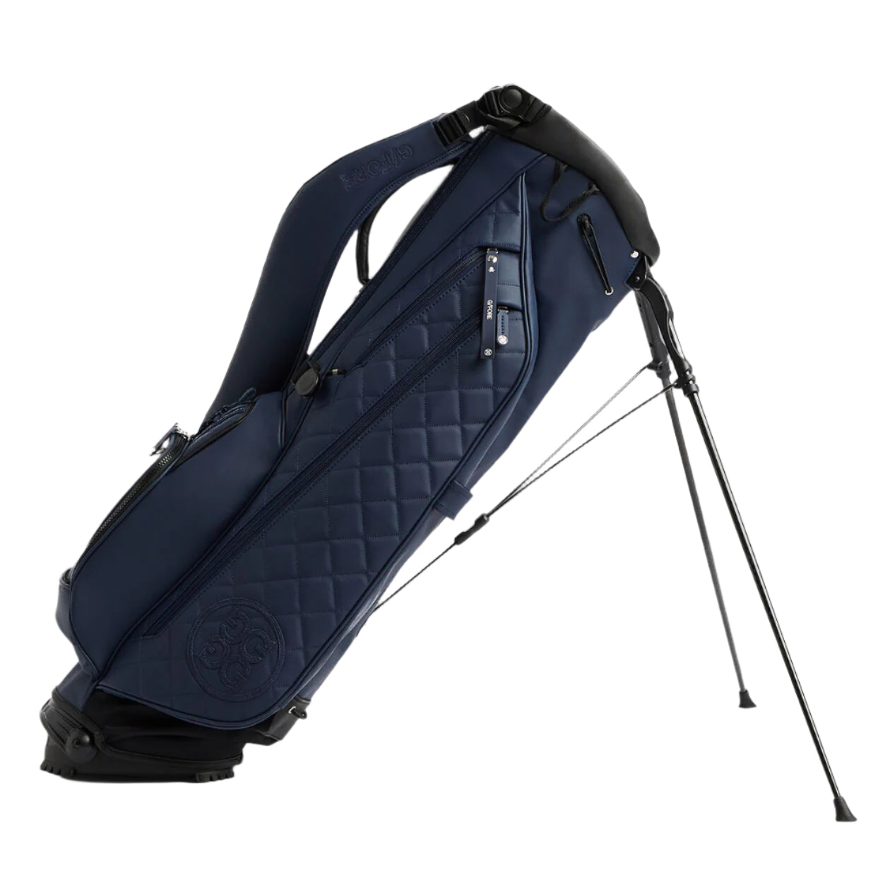 Navy blue golf bag with quilted pattern on a gray background