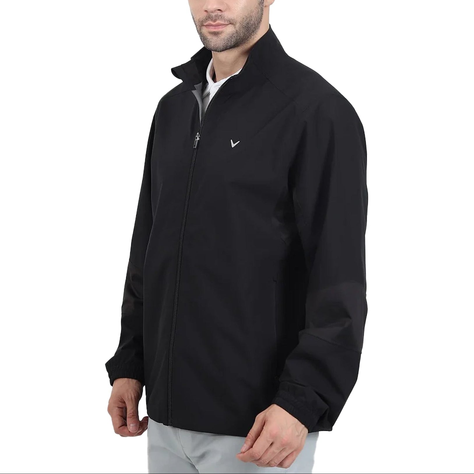 A man wearing a black Callaway Bonville Ultralight Rain Jacket with a collar, front zipper, and the Callaway logo on the chest.