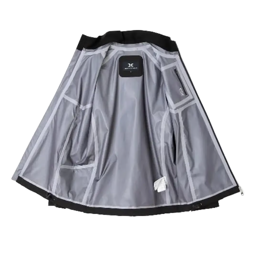 A light gray waterproof golf jacket shown from the back, featuring a black waistband, black side zippers, and a black interior patch with a white logo.