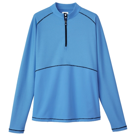 A blue turtleneck women's golf mid-layer with half zip and rib detailing.