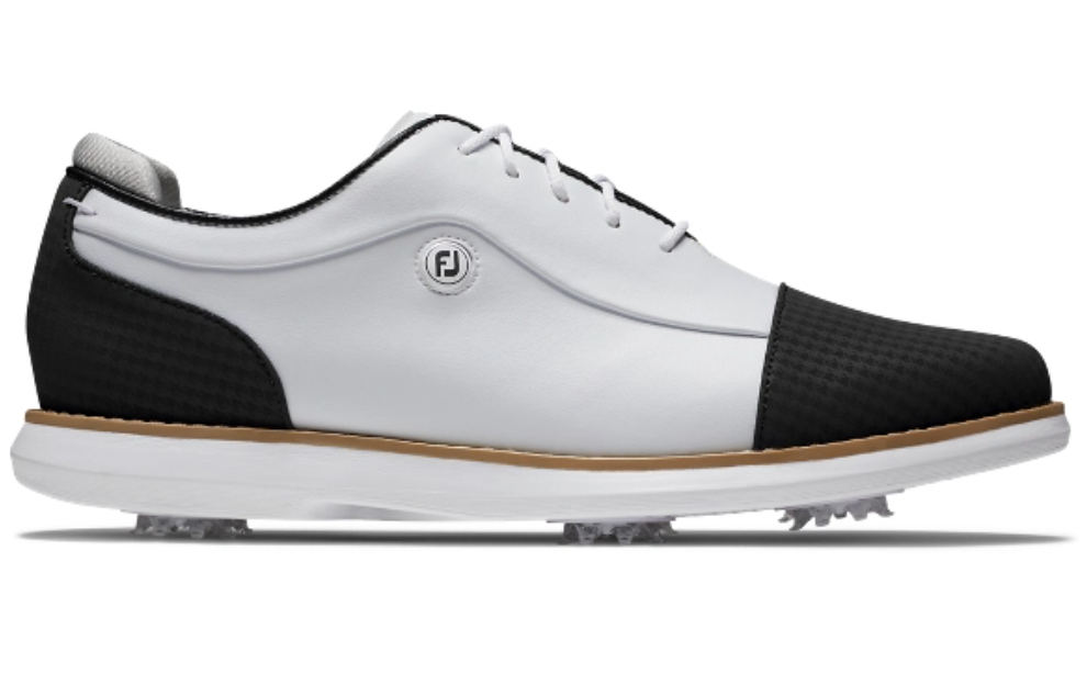 A white and black FootJoy golf shoe with cleats, designed for women.