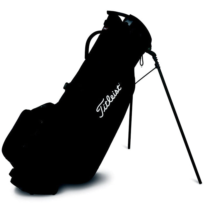 A black Titleist Players 4 Carbon Carry Bag with stand legs, featuring a premium double strap and the brand logo visible.
