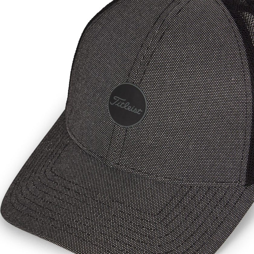Black cap with Titleist logo on a white background