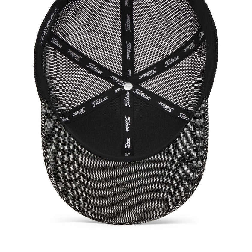 Black and gray cap with 'Titleist' branding on a white background