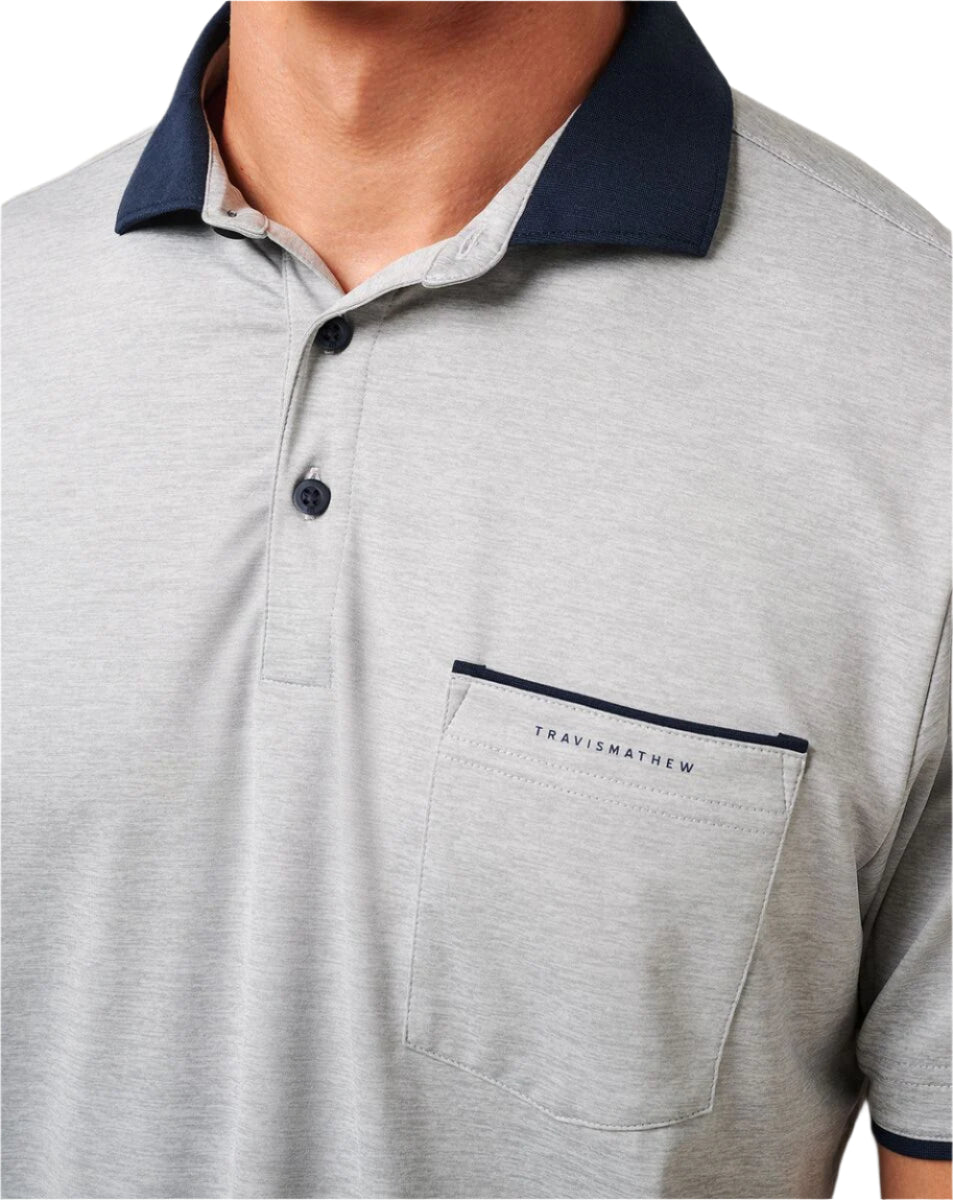 Gray polo shirt with navy collar and trim on a neutral background