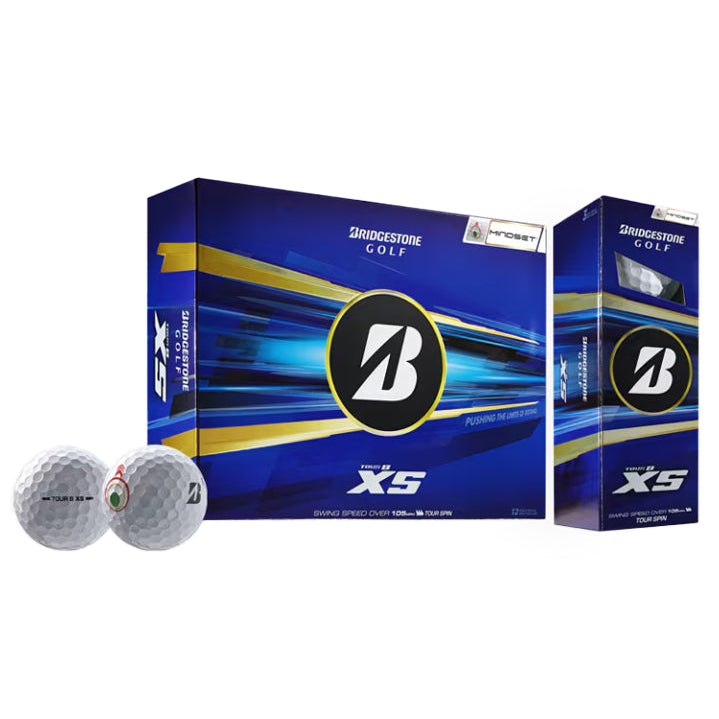 Two Bridgestone golf balls with two boxes of Bridgestone XS golf balls on a white background