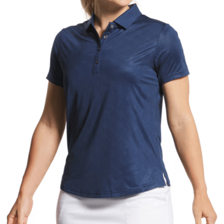 Woman wearing a navy blue polo shirt and white skirt on a transparent background