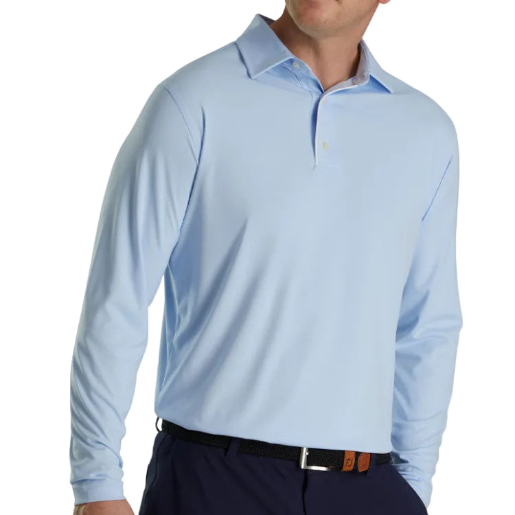man wearing light blue golf polo long sleeve