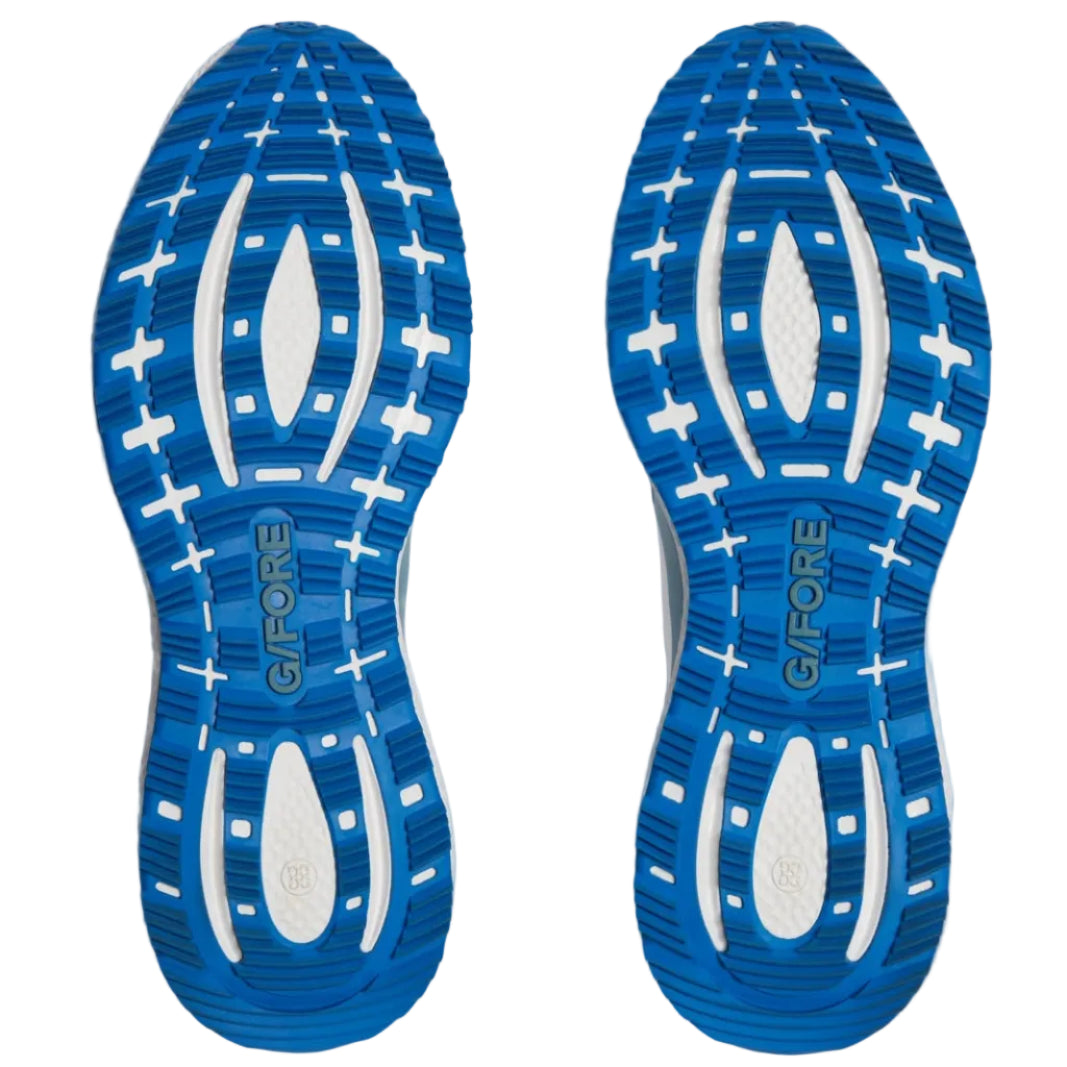 Blue and white G/FORE golf shoe sole on a light gray background