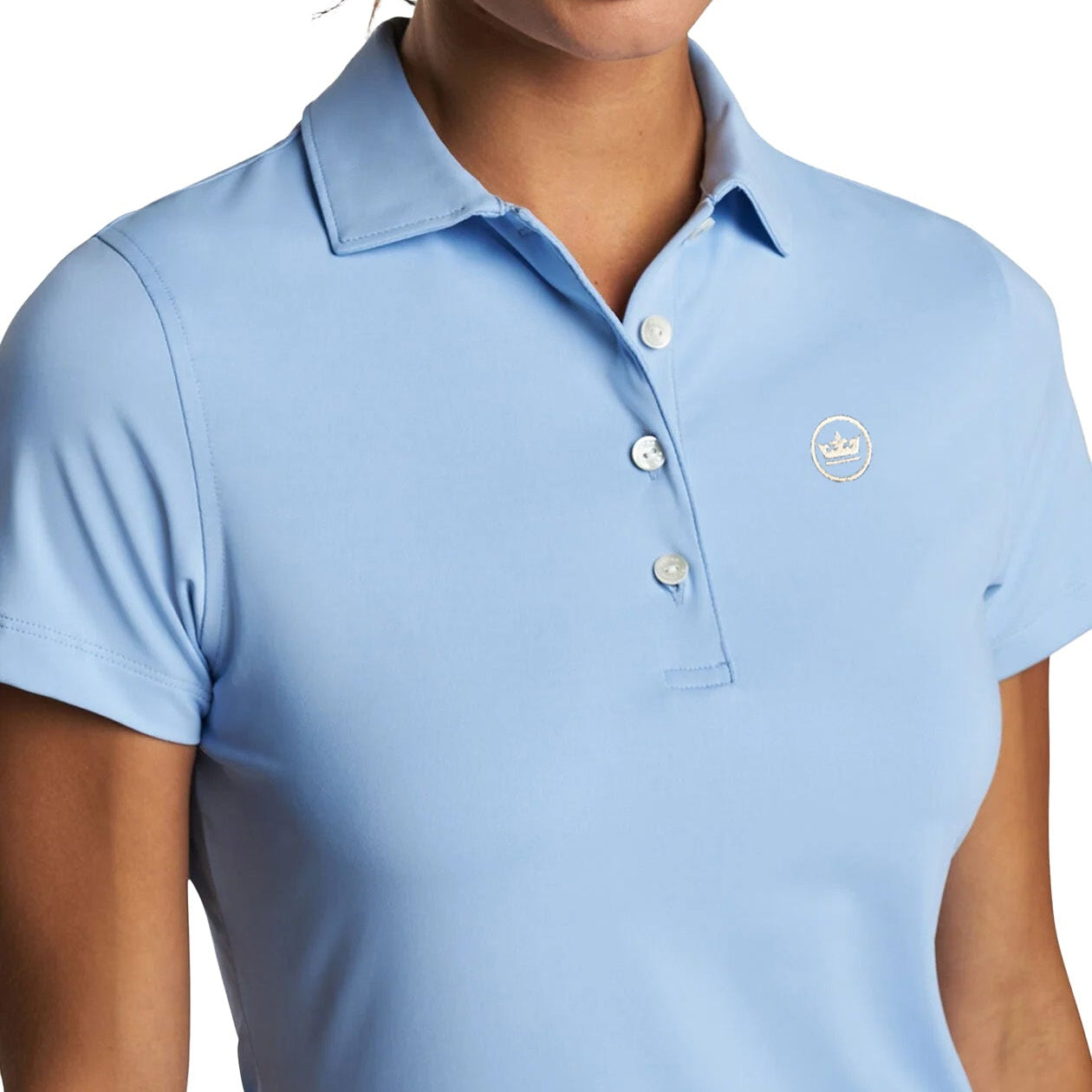 womens golf polo in light blue with crown logo