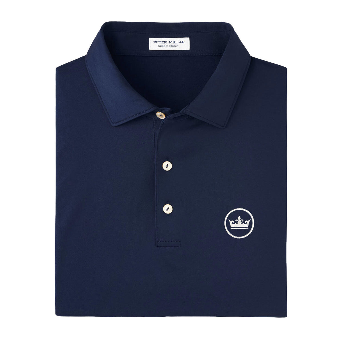 A folded navy blue polo shirt with a white embroidered crown logo on the left chest, displayed on a clean white background.