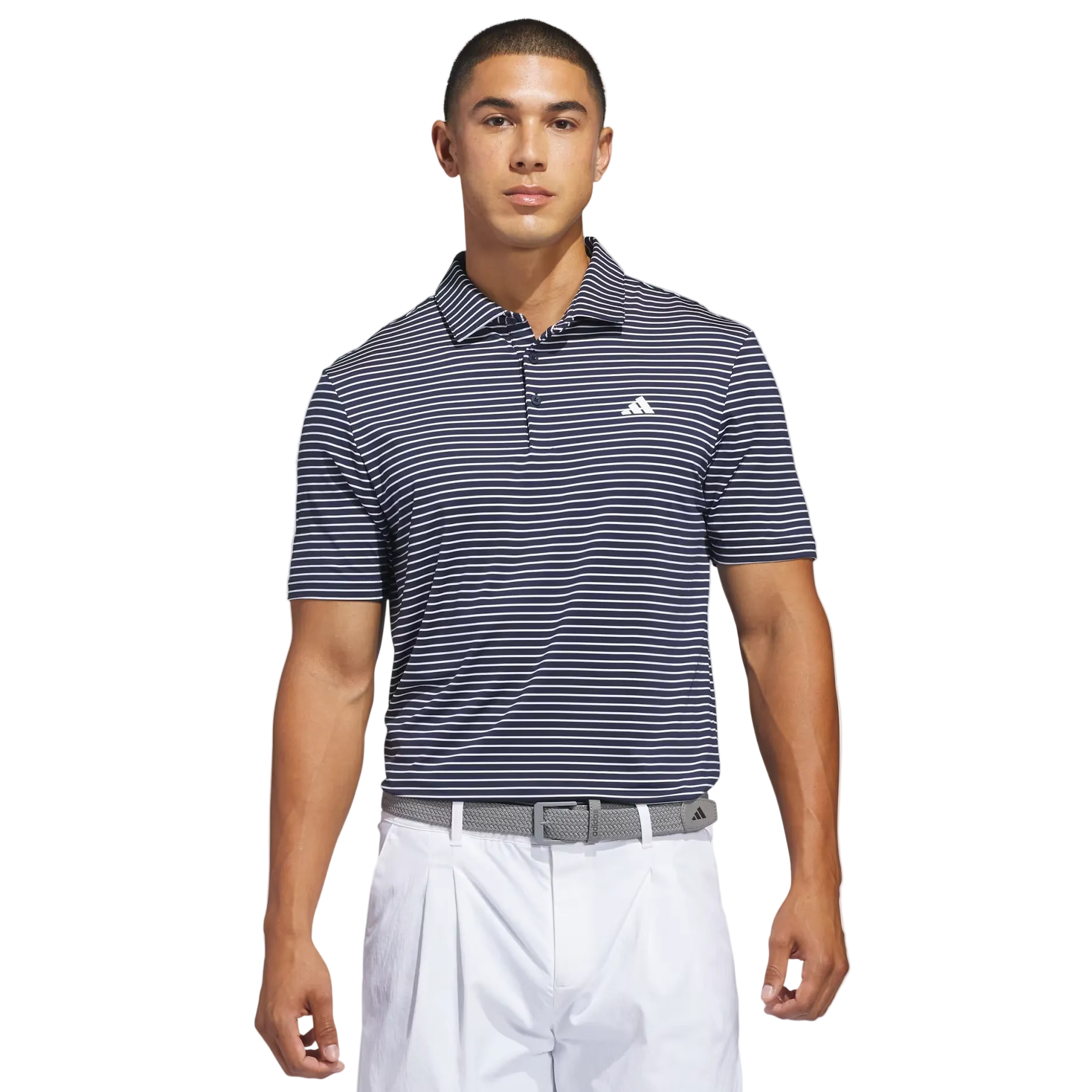 Man wearing a striped Adidas polo shirt and white pants