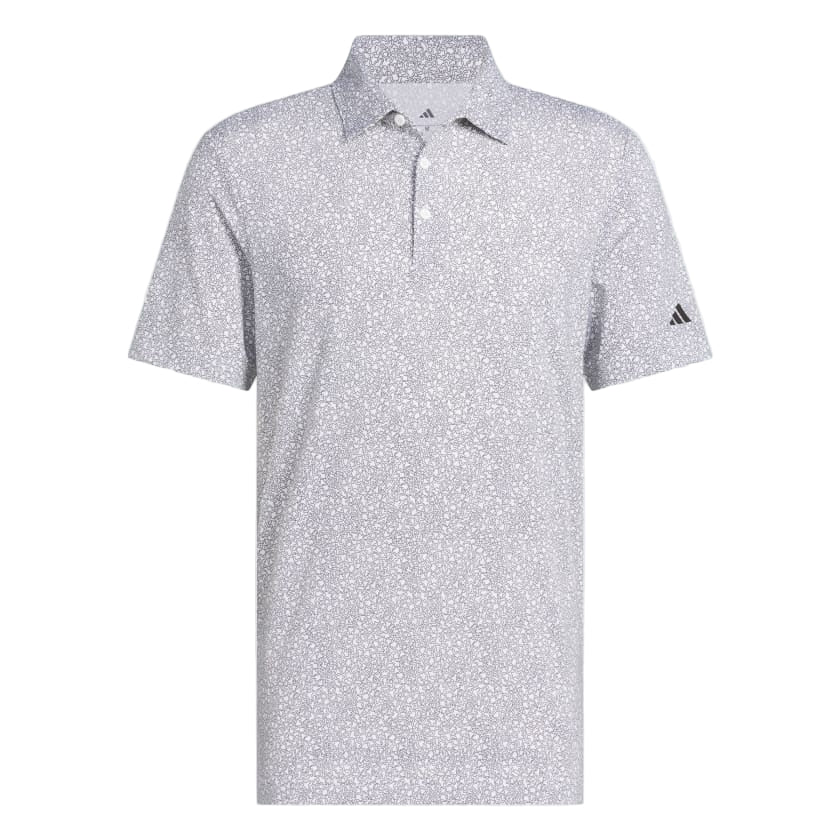 An Adidas men's golf polo shirt in white and black with a classic cut collar and three buttons.