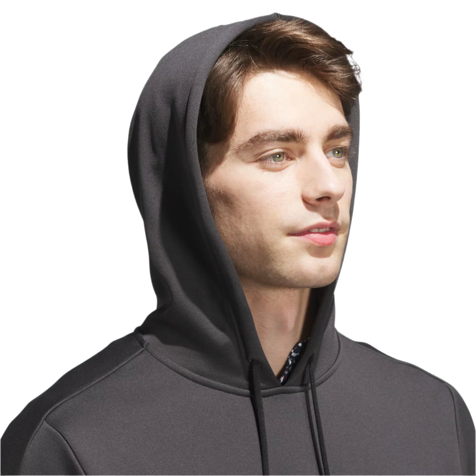 Man wearing a gray hoodie against a plain background