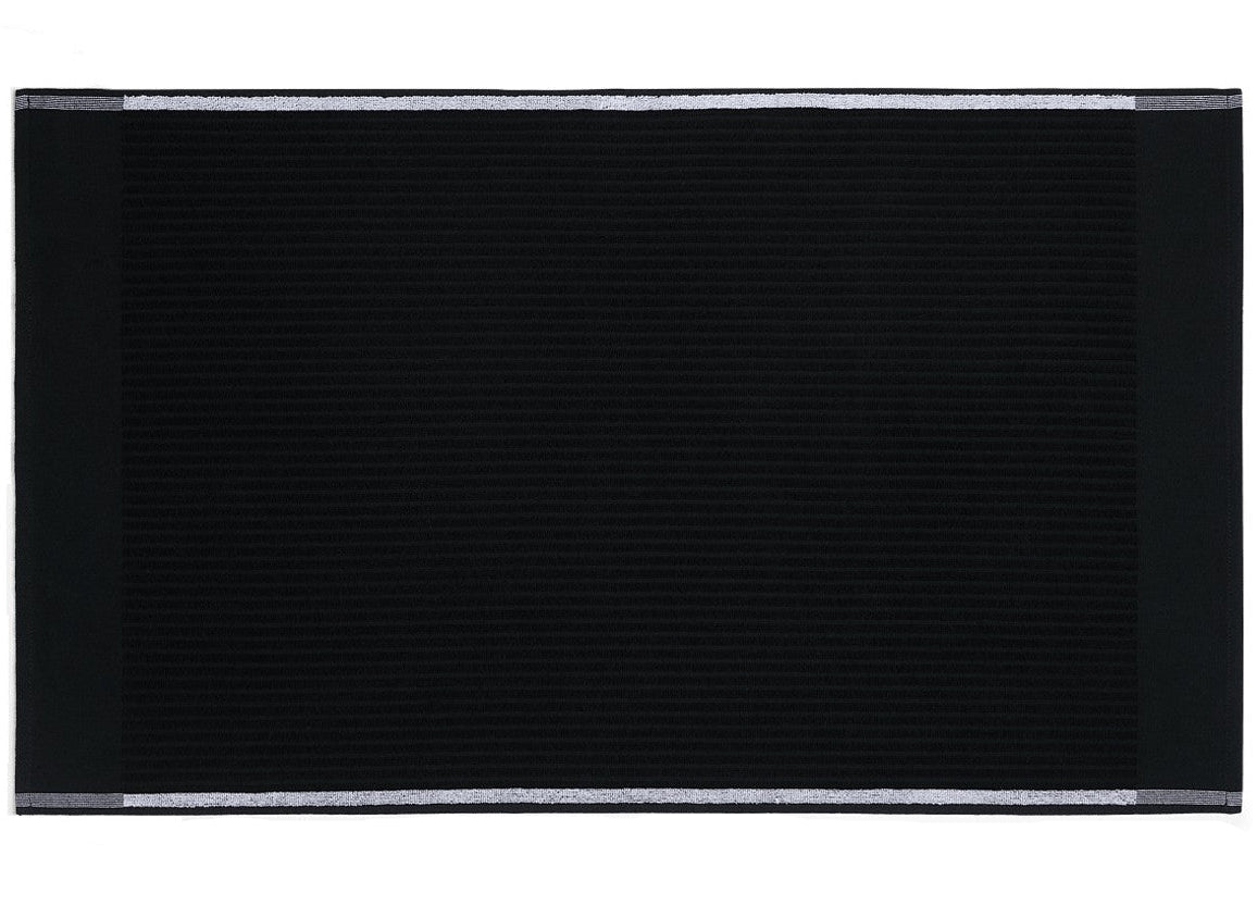 A black golf towel with a white stripe, featuring a woven ribbed pattern.
